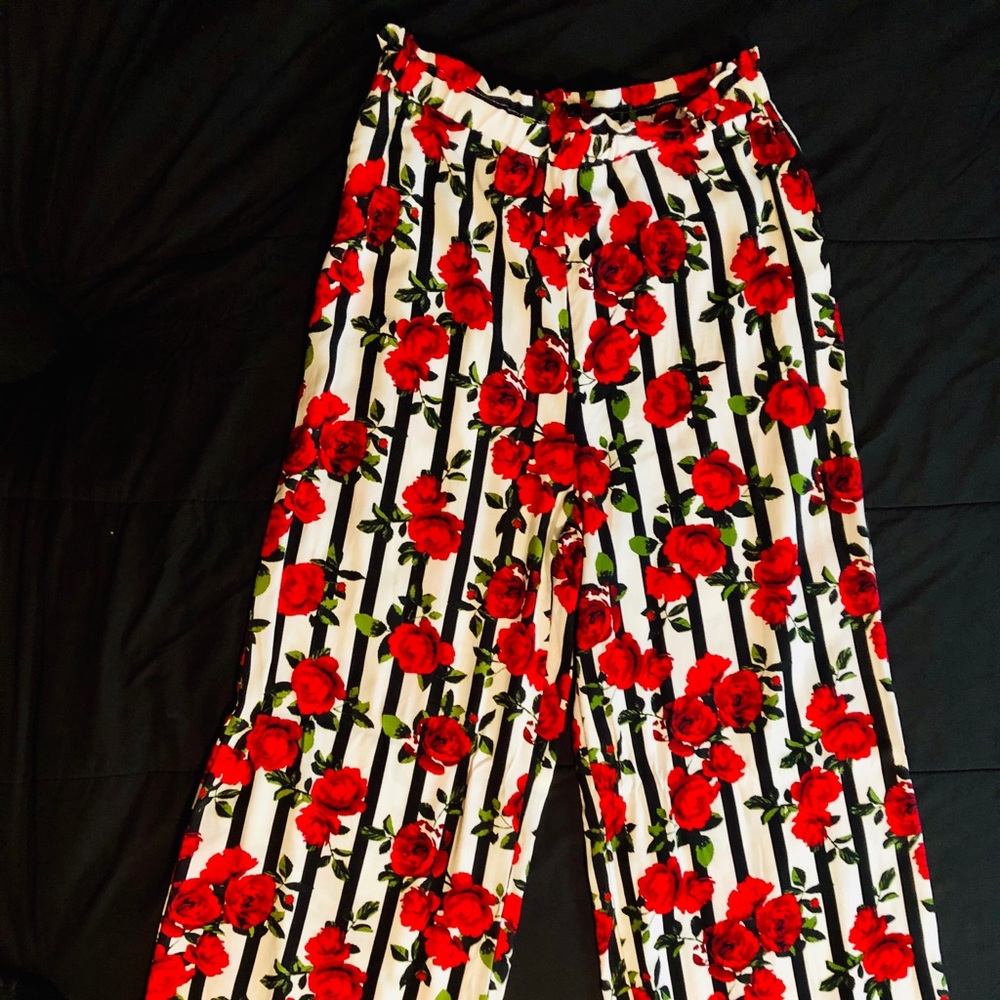 Rose covered palazzo pants with stripes
